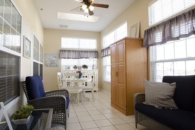 Bright living space with dining area and natural light.