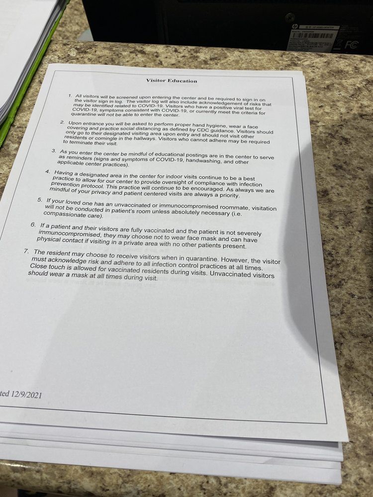 A printed document with guidelines and instructions on a table.