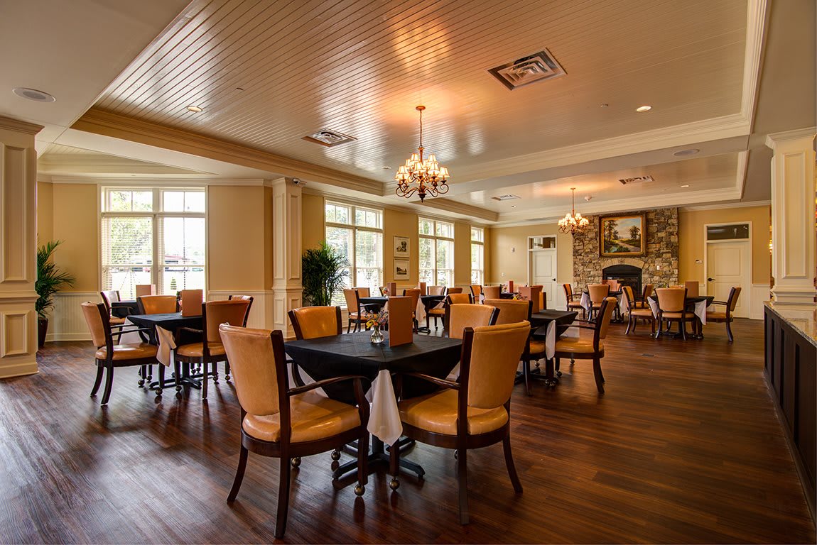 A cozy restaurant dining area with elegant dcor and ample seating.