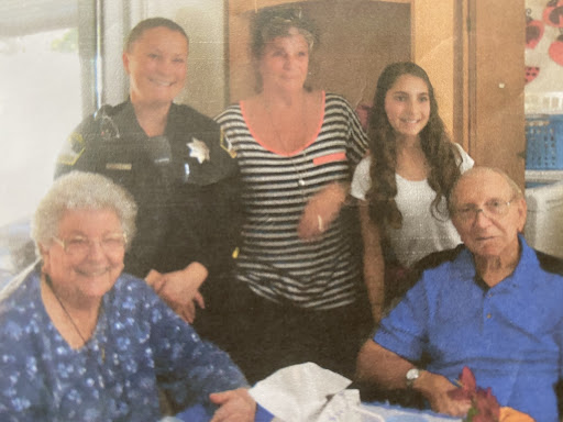 A joyful family gathering, featuring various generations together.