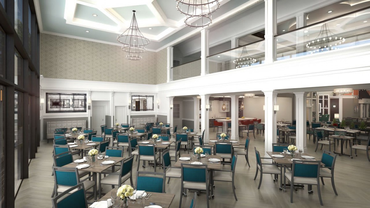 A modern dining area with elegant chandeliers and neatly arranged tables and chairs.
