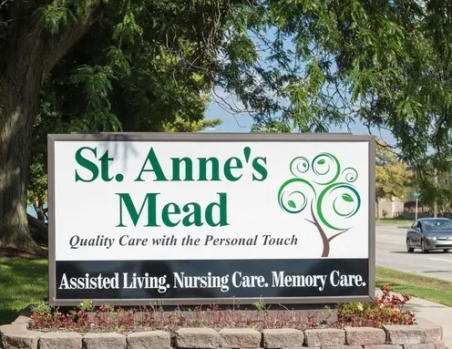 A sign for St. Anne's Mead, an assisted living facility, offering nursing and memory care services.