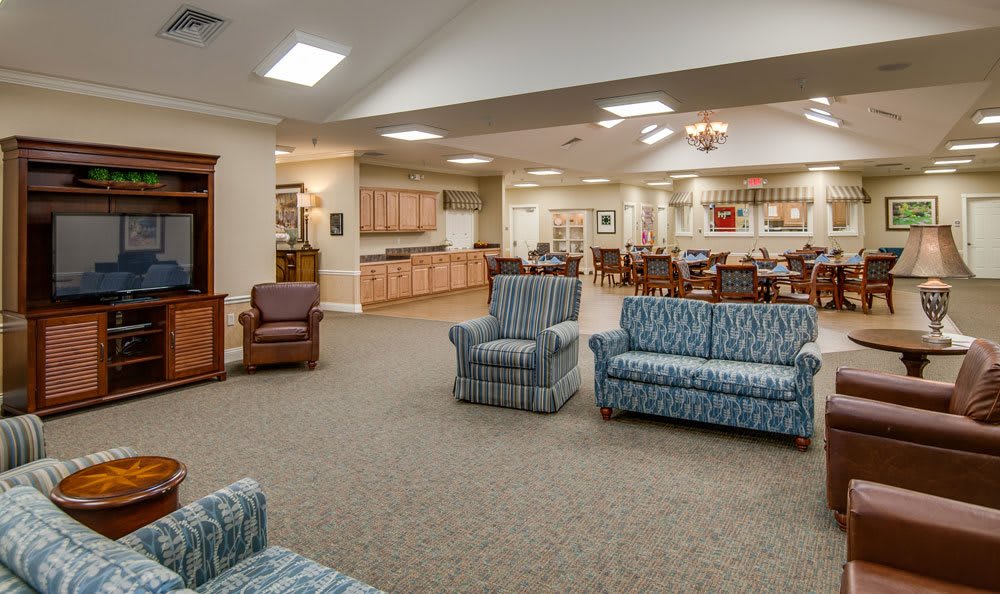 A spacious lounge area with comfortable seating and an open layout.