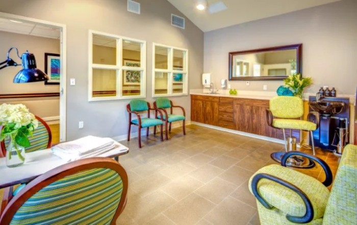 A modern waiting room with comfortable seating and a welcoming reception area.