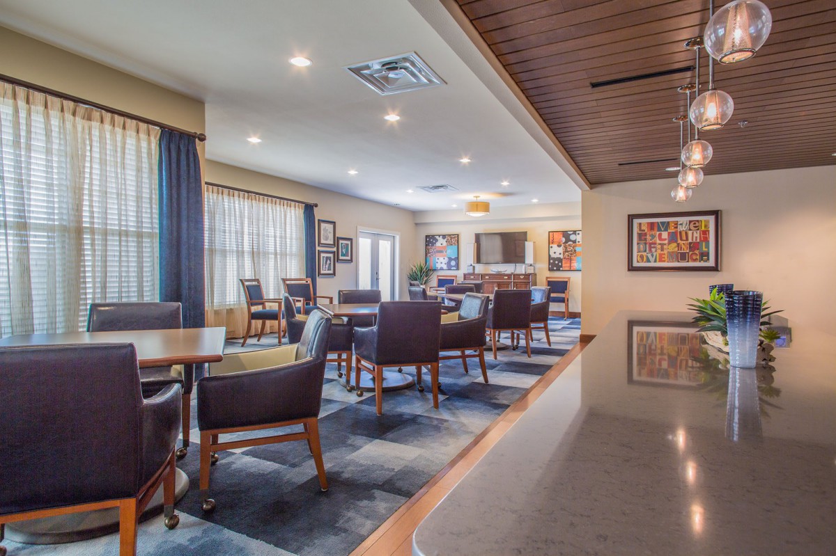 A modern lounge with comfortable seating and elegant decor.
