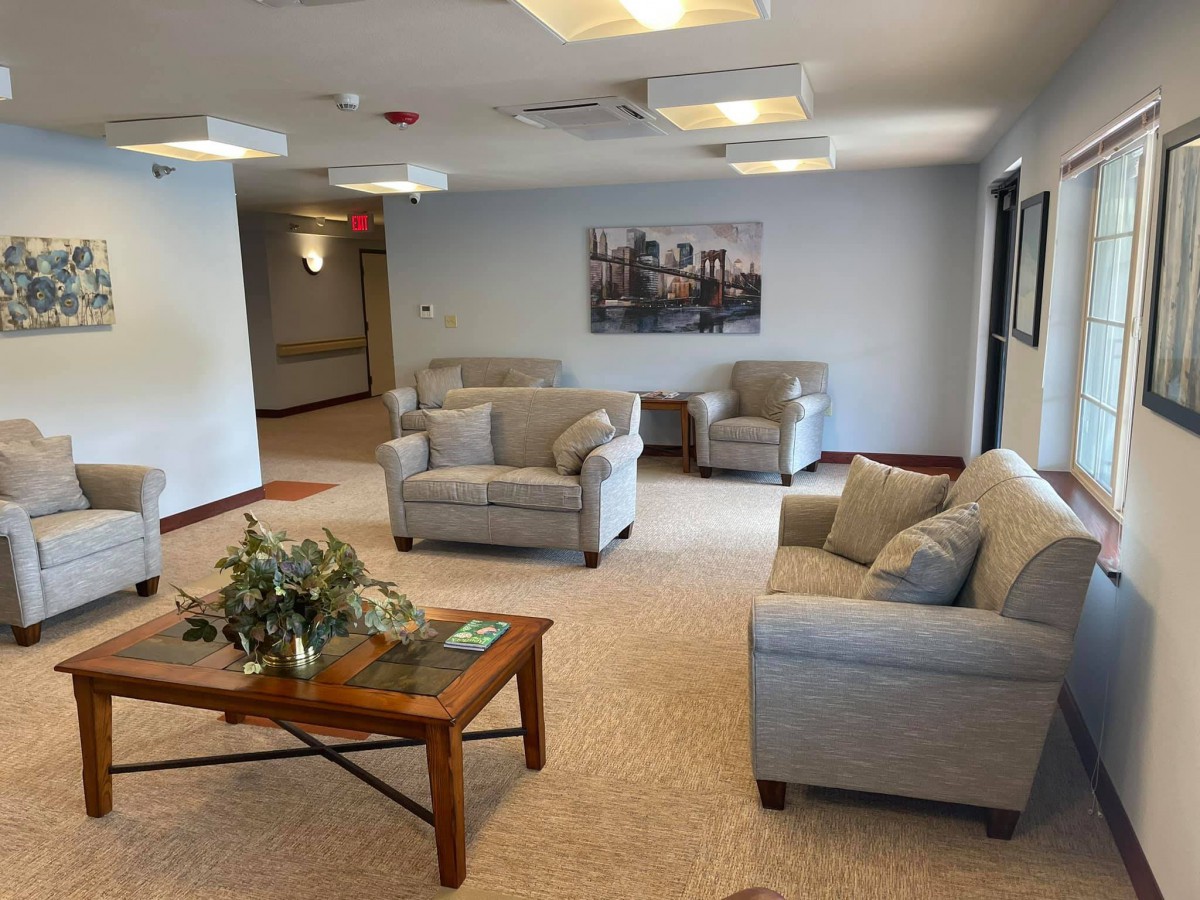 A cozy living room with comfortable seating and modern decor.