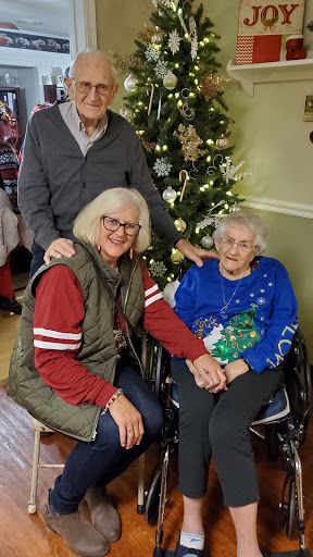 A joyful family gathering during the holiday season, sharing love and togetherness.