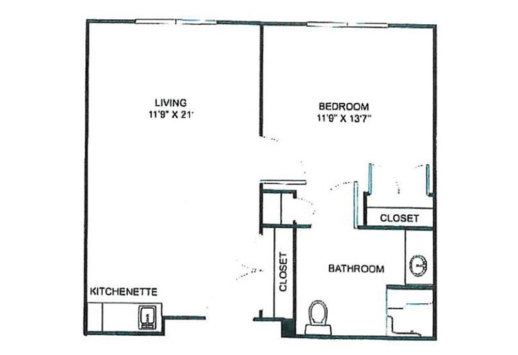 A one-bedroom apartment floor plan featuring a living room, kitchenette, bathroom, and closets.