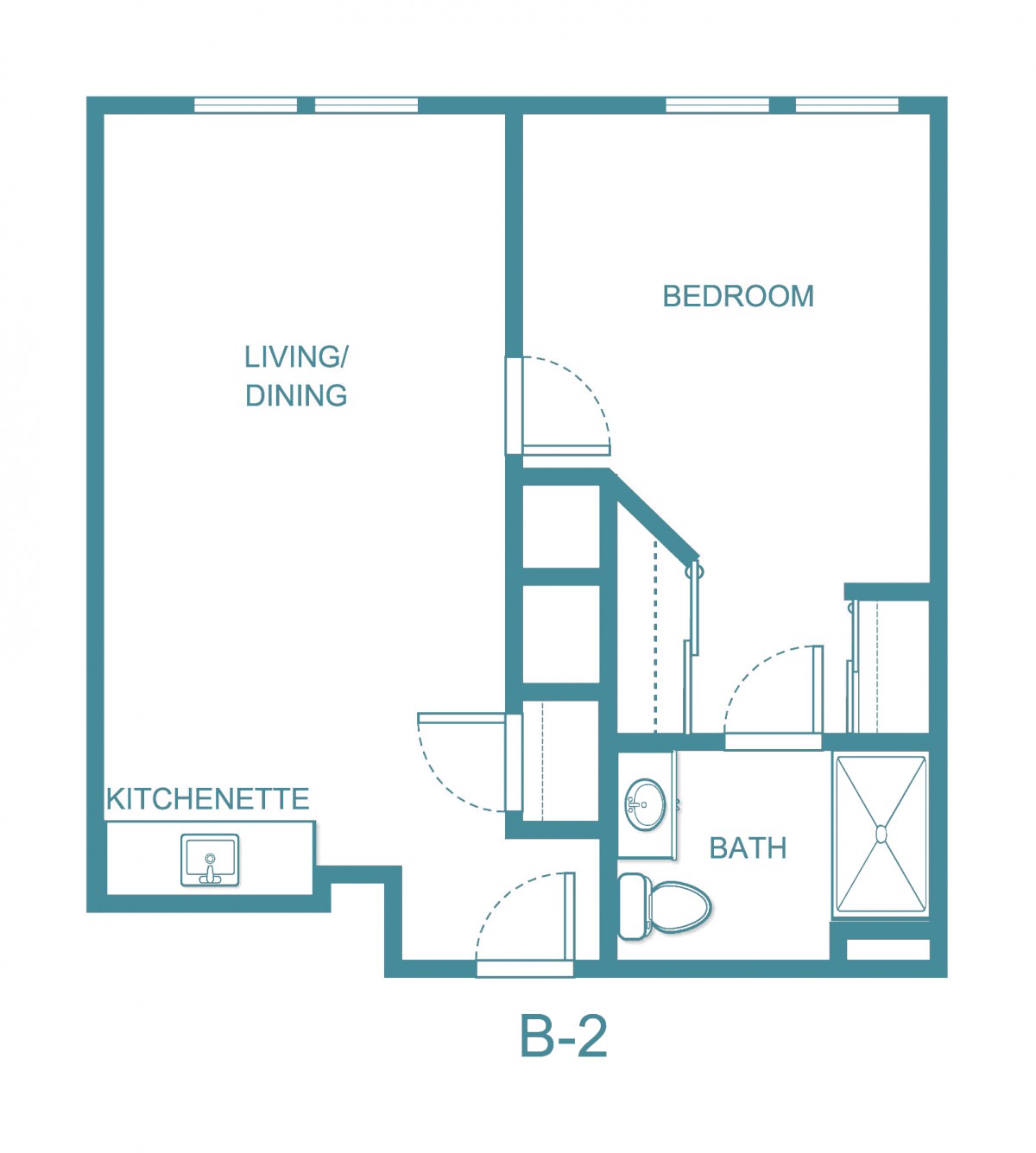A floor plan of a one-bedroom apartment with a living/dining area, kitchenette, bathroom, and bedroom.
