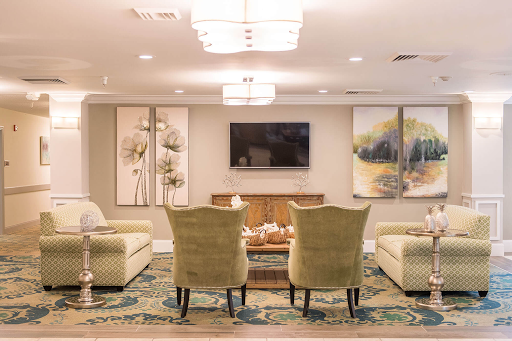 A cozy and modern living room setup with comfortable seating and elegant decor.