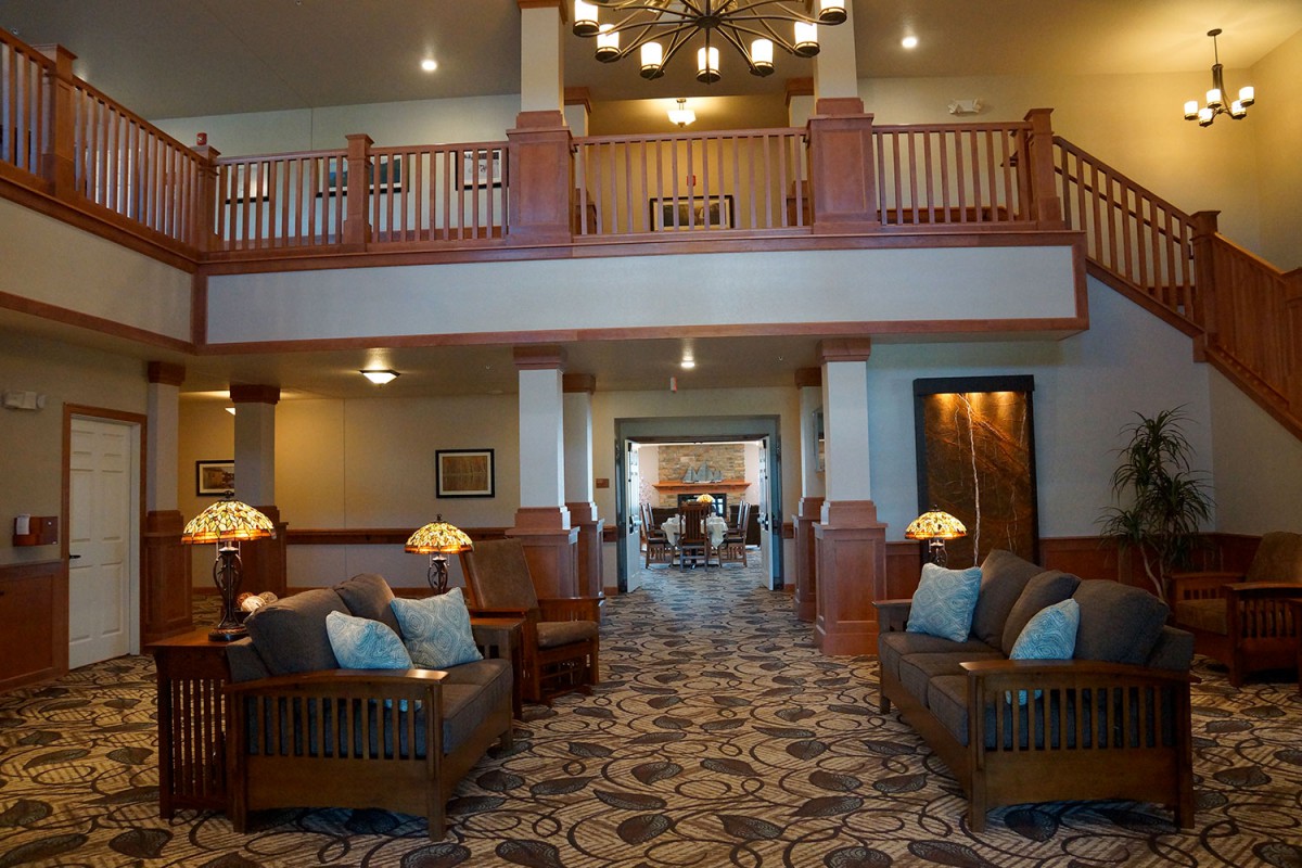 A spacious and elegantly designed hotel lobby featuring comfortable seating and stylish lighting.