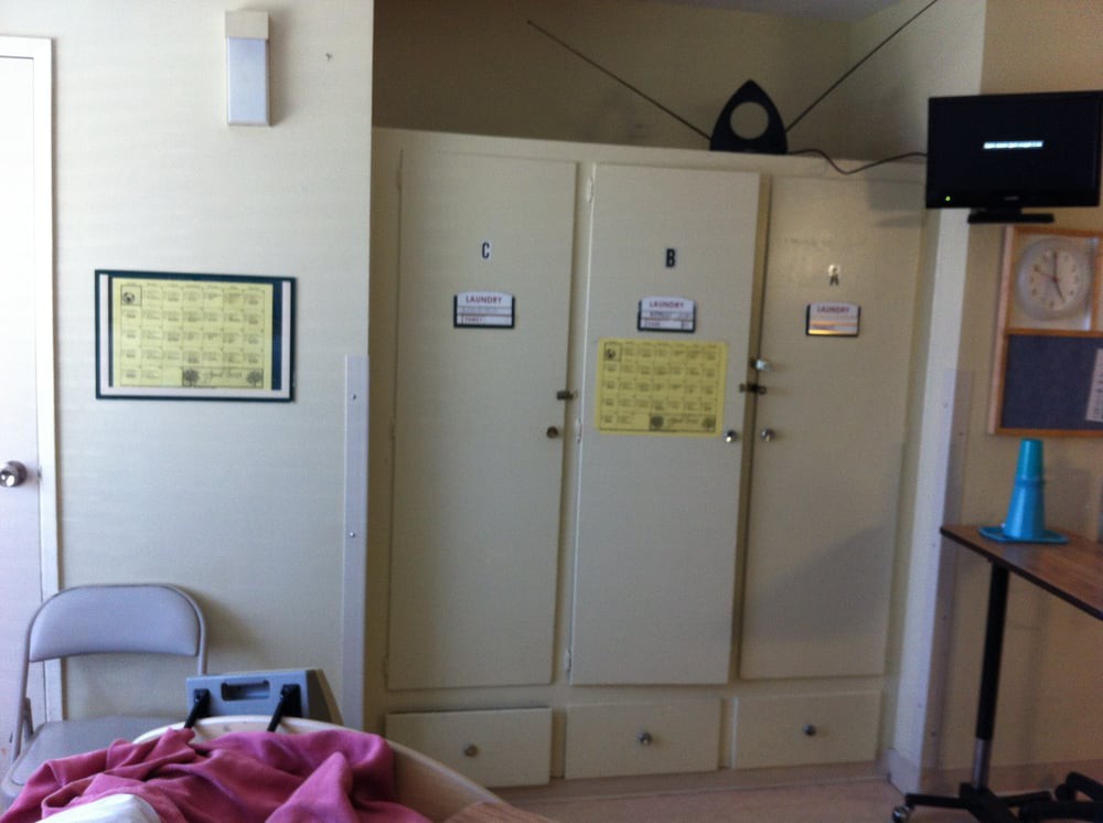 A room with a set of lockers used for storage.