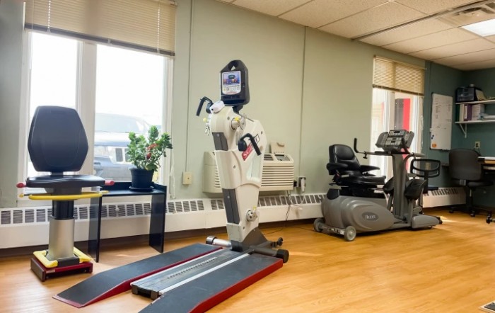 A rehabilitation center with specialized exercise equipment for therapy.