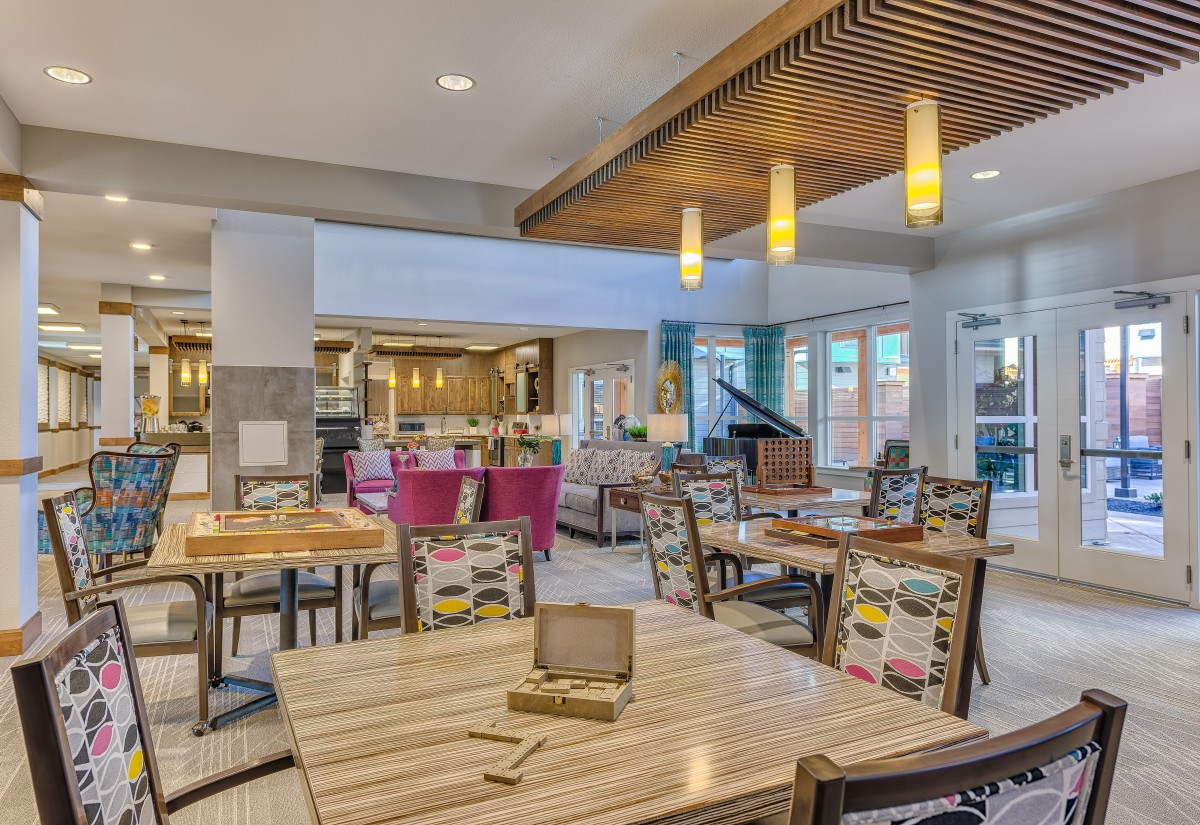 A modern restaurant dining area with stylish decor and comfortable seating.