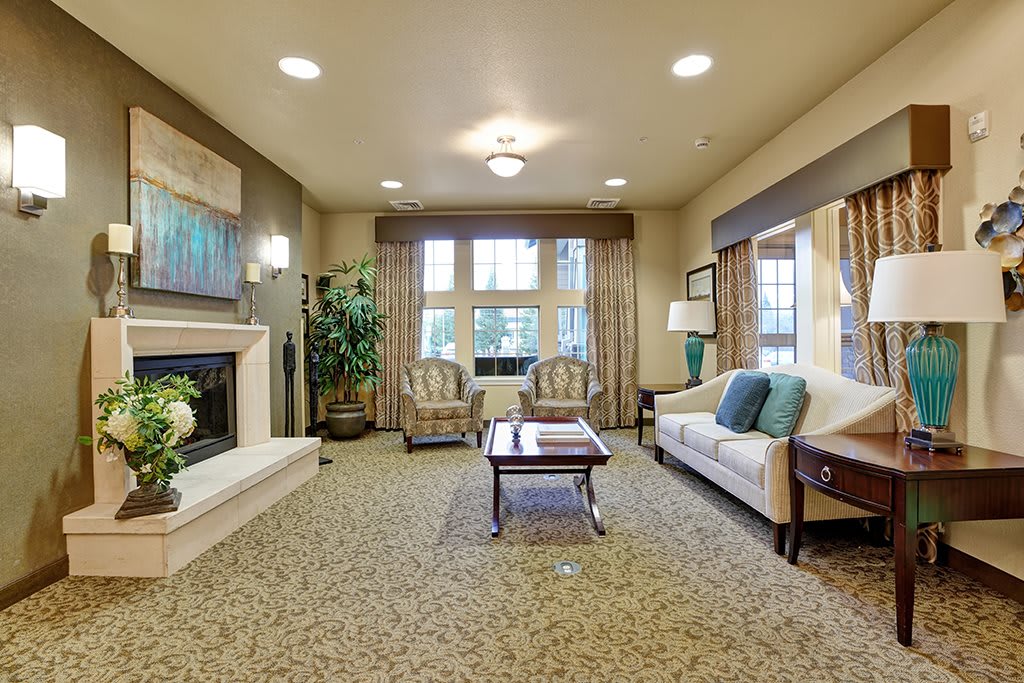 A cozy living room with elegant decor and comfortable seating.