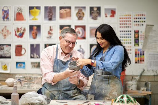 A collaborative pottery session showcasing creativity and craftsmanship.