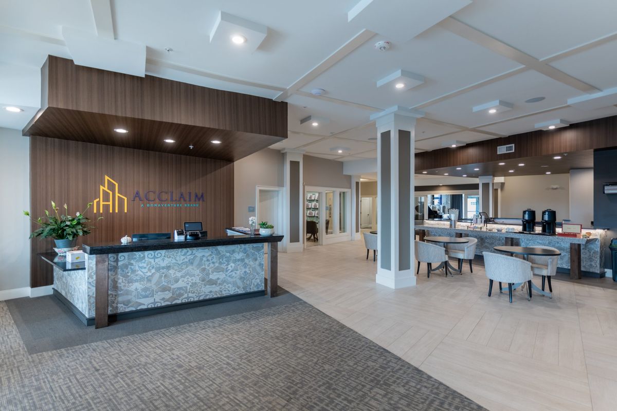 A modern reception area with a seating and waiting space.