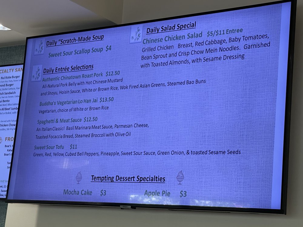 A restaurant menu displayed on a screen, showcasing daily food specials.