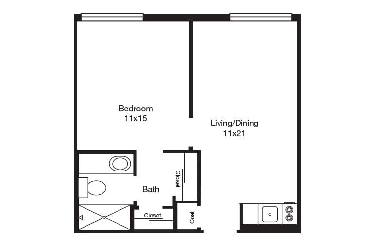 A simple floor plan showing a one-bedroom apartment with a living/dining area, bathroom, and kitchen.