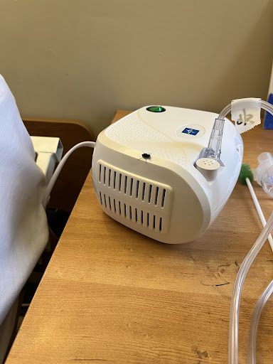 A nebulizer device used for administering medication in the form of a mist to treat respiratory conditions.