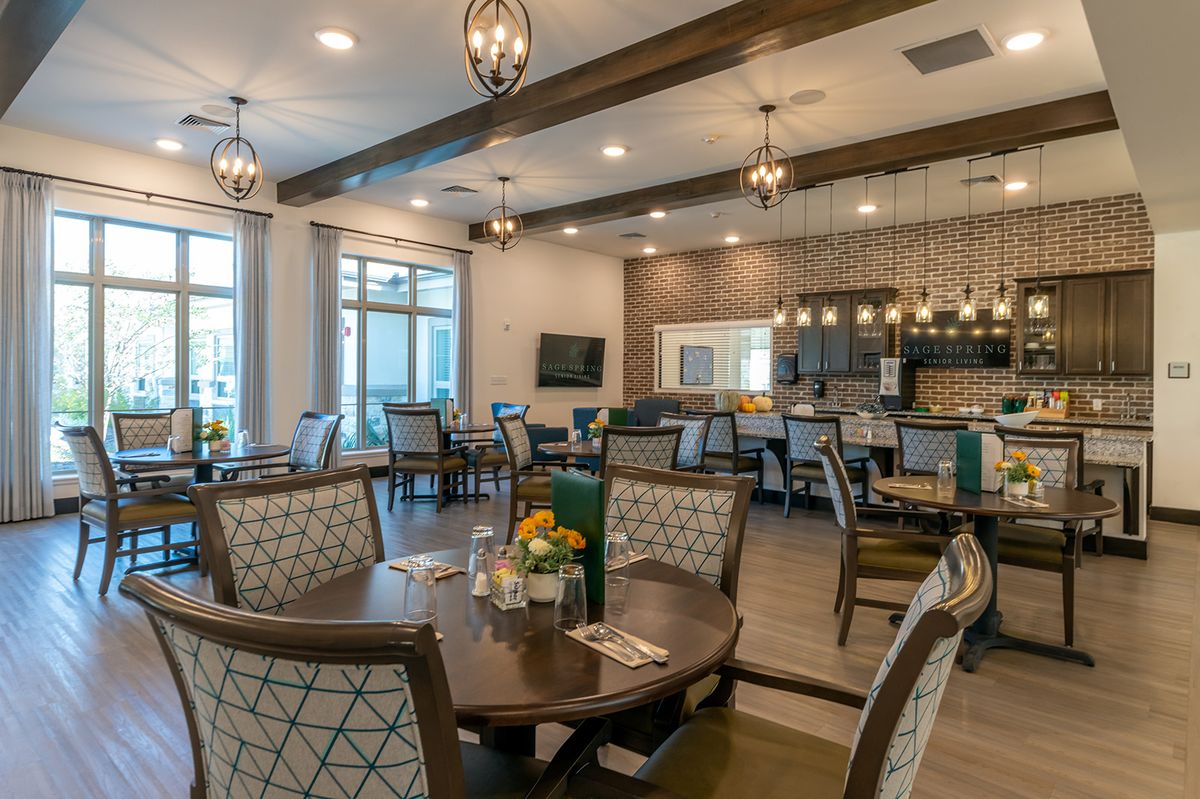 A modern dining area with elegant decor and comfortable seating.