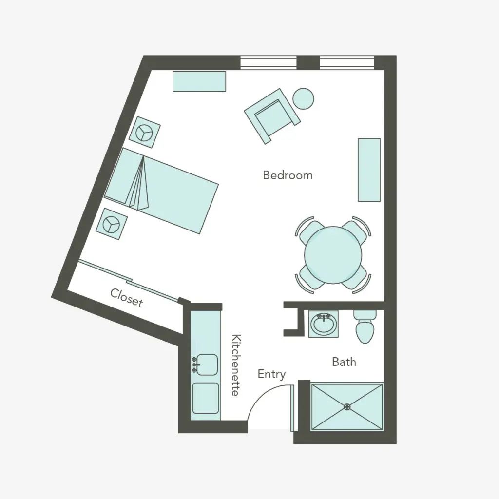 Studio apartment floor plan with designated areas for a bedroom, bathroom, kitchen, and living space.