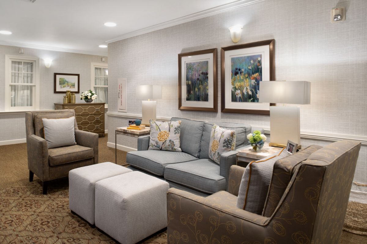 A cozy living room with modern furniture and elegant decor.