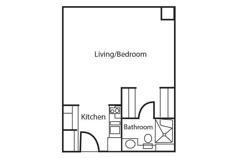 A floor plan of a studio apartment with a combined living/bedroom area, kitchen, and bathroom.