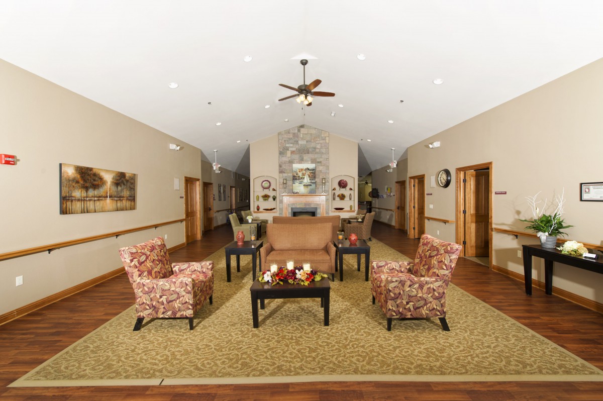 A cozy living room with comfortable seating and elegant decor.