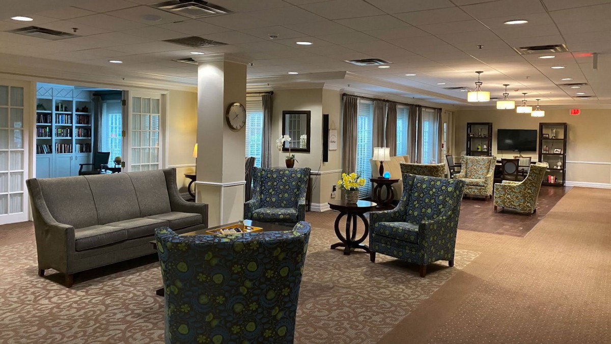 A cozy lobby area with comfortable seating and warm lighting.