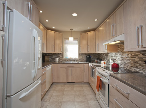 A modern kitchen featuring sleek cabinetry and contemporary appliances.