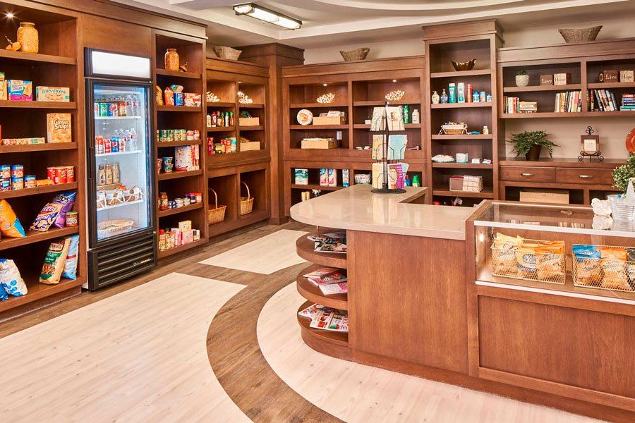 A well-organized pharmacy with wooden shelves displaying various health products and medicines.