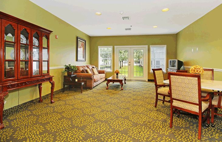 Spacious living area with comfortable seating and elegant decor.