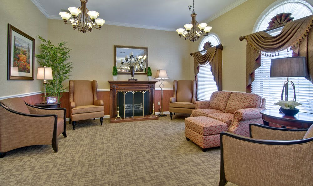 A traditional living room with elegant furniture and a warm ambiance.