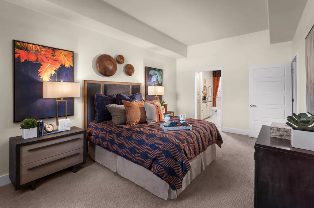 A cozy and modern bedroom with stylish decor and comfortable furnishings.