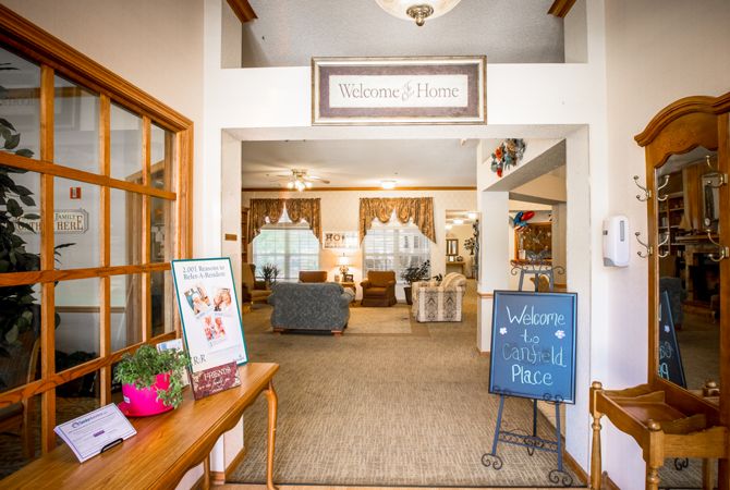 A warm and welcoming lobby area with comfortable seating and decorative elements.