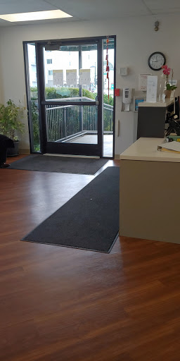 A view of the office entrance with a welcoming lobby area.