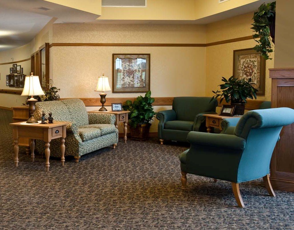 A cozy lobby area with comfortable seating and warm lighting.