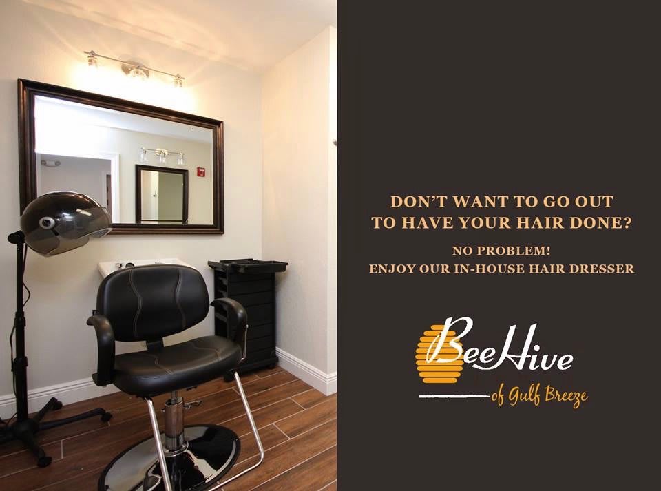 Cozy hair salon space with a chair and mirror, promoting home appointment services.