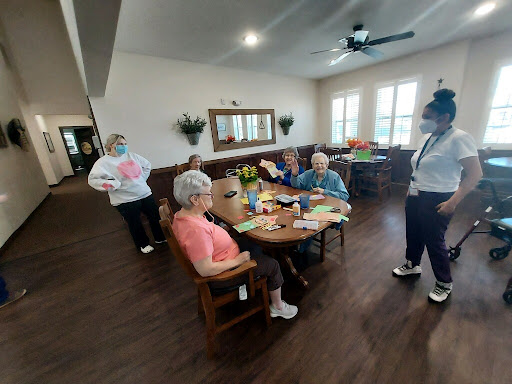 Seniors engaging in a creative crafting session together.