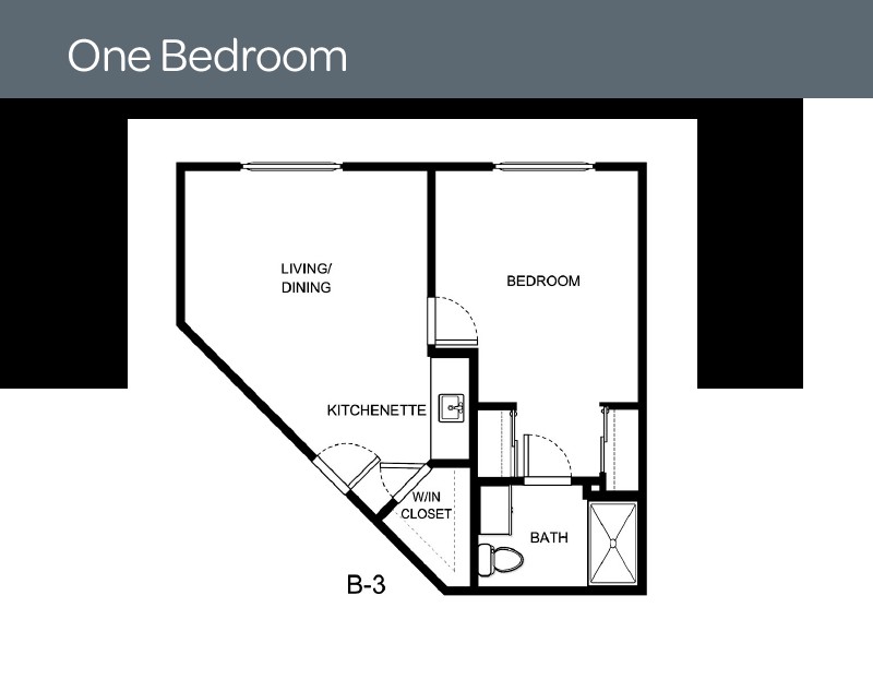 A floor plan of a one-bedroom apartment featuring a living space, kitchenette, bath, and walk-in closet.