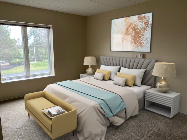 A modern bedroom with neutral tones and pastel accents featuring a king-size bed, stylish artwork, and large window.
