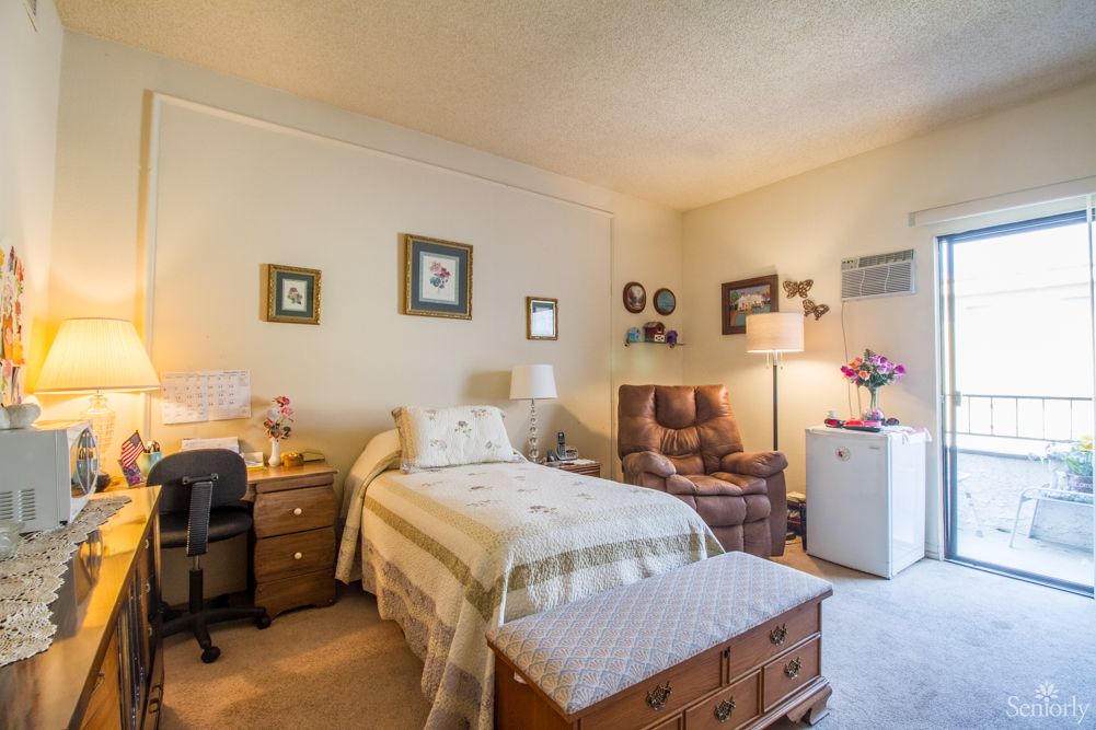 A cozy bedroom with classic furniture and decor.