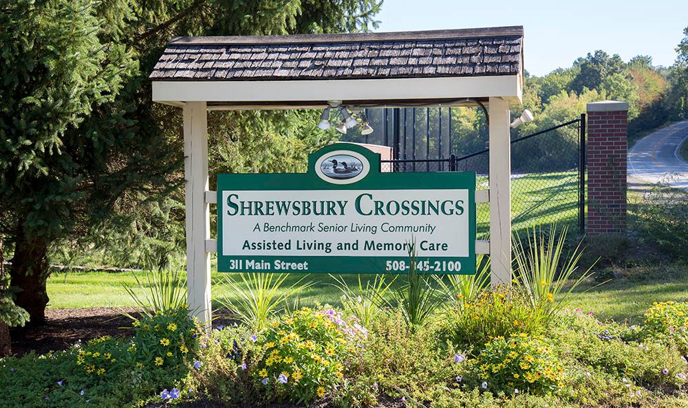 Sign for Shrewsbury Crossings, an assisted living and memory care community.