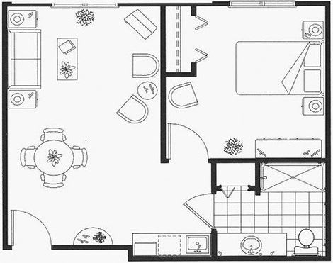 A detailed floor plan of a small apartment, showing the layout of rooms and furniture.