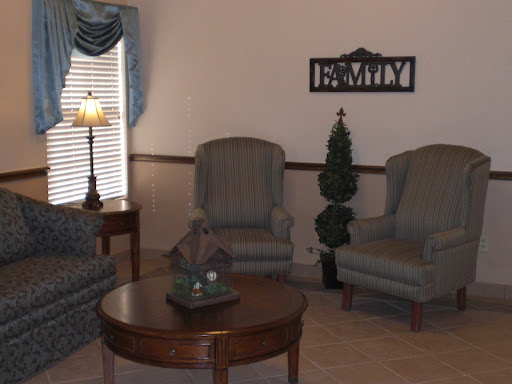 A cozy living room setup with comfortable seating and a warm ambiance.