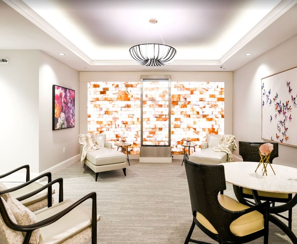 A modern lounge area with comfortable seating and elegant decor.