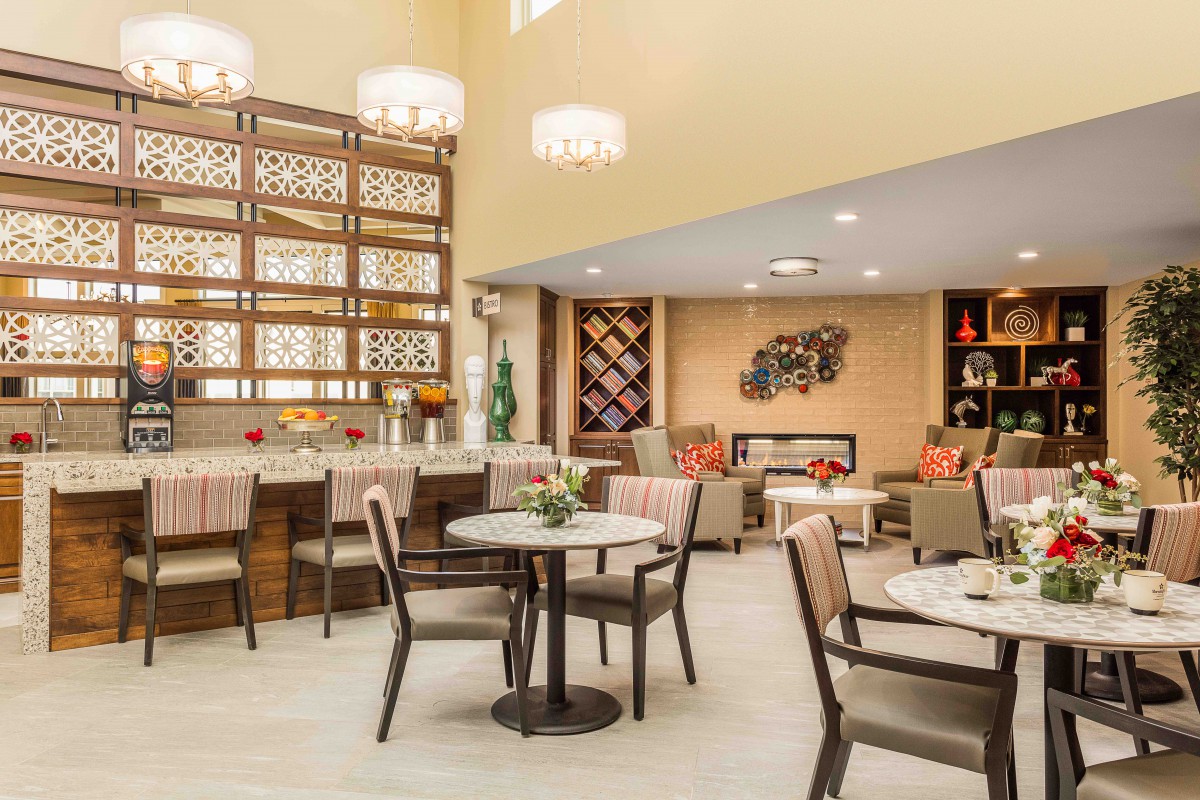 A modern dining area with elegant decor and comfortable seating.
