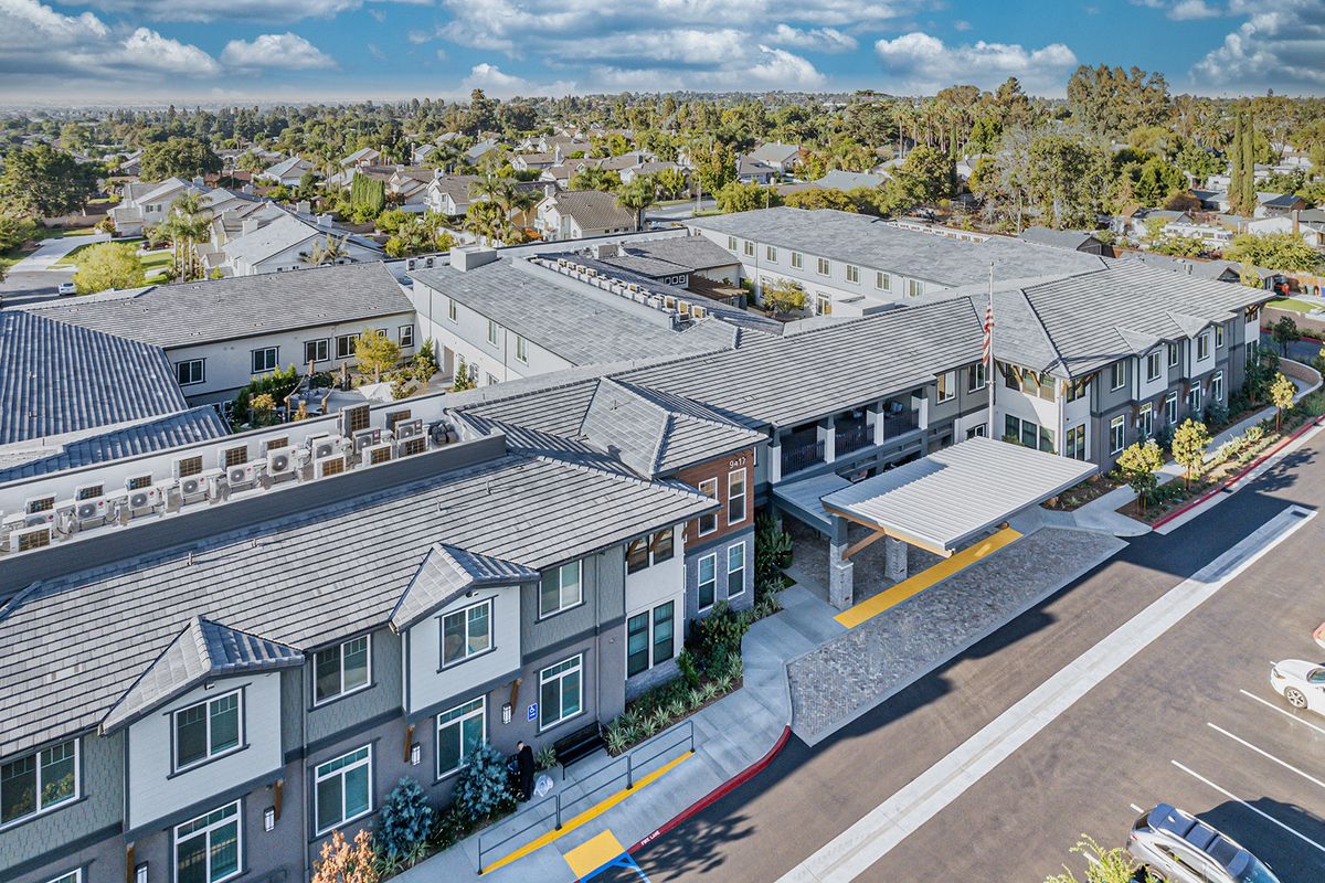 Aerial view of a suburban residential neighborhood with modern townhouses.