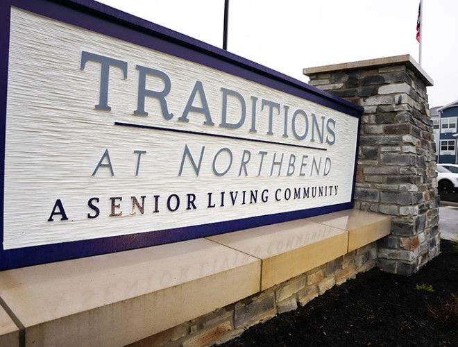 Sign for Traditions at Northbend, a senior living community.